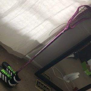 Lacrosse stick and cleats